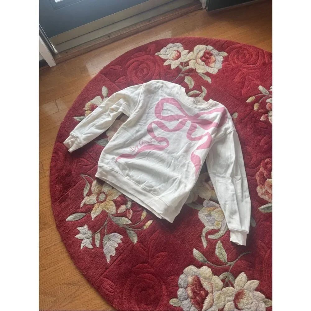 Dry Goods White Sweatshirt with Pink Ribbon Graphic